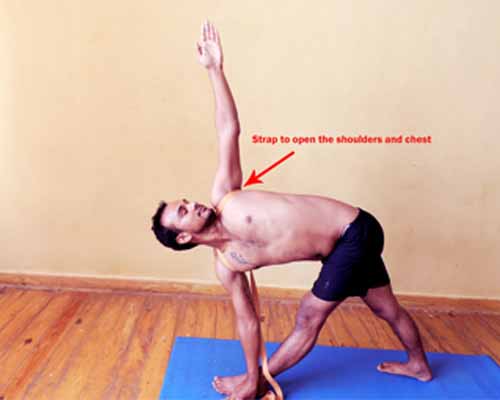 Parivrtta  trikonasana open shoulders with using strap