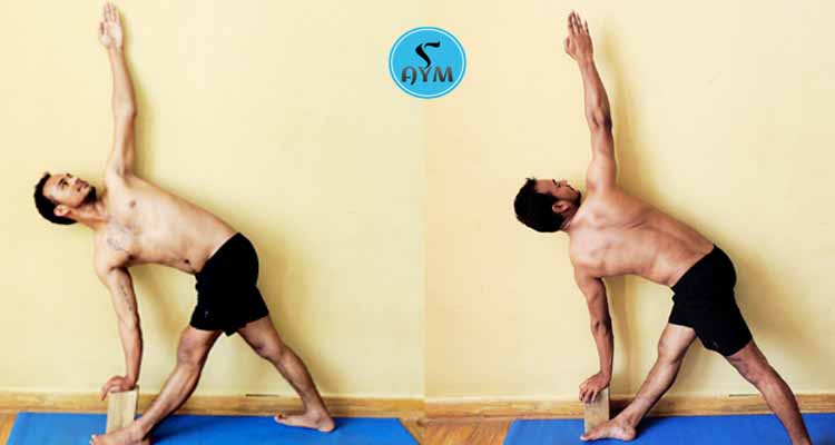 Parivrtta trikonasana with wall