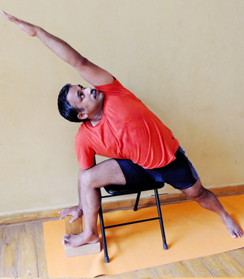 utthita parsavakonasana with chair