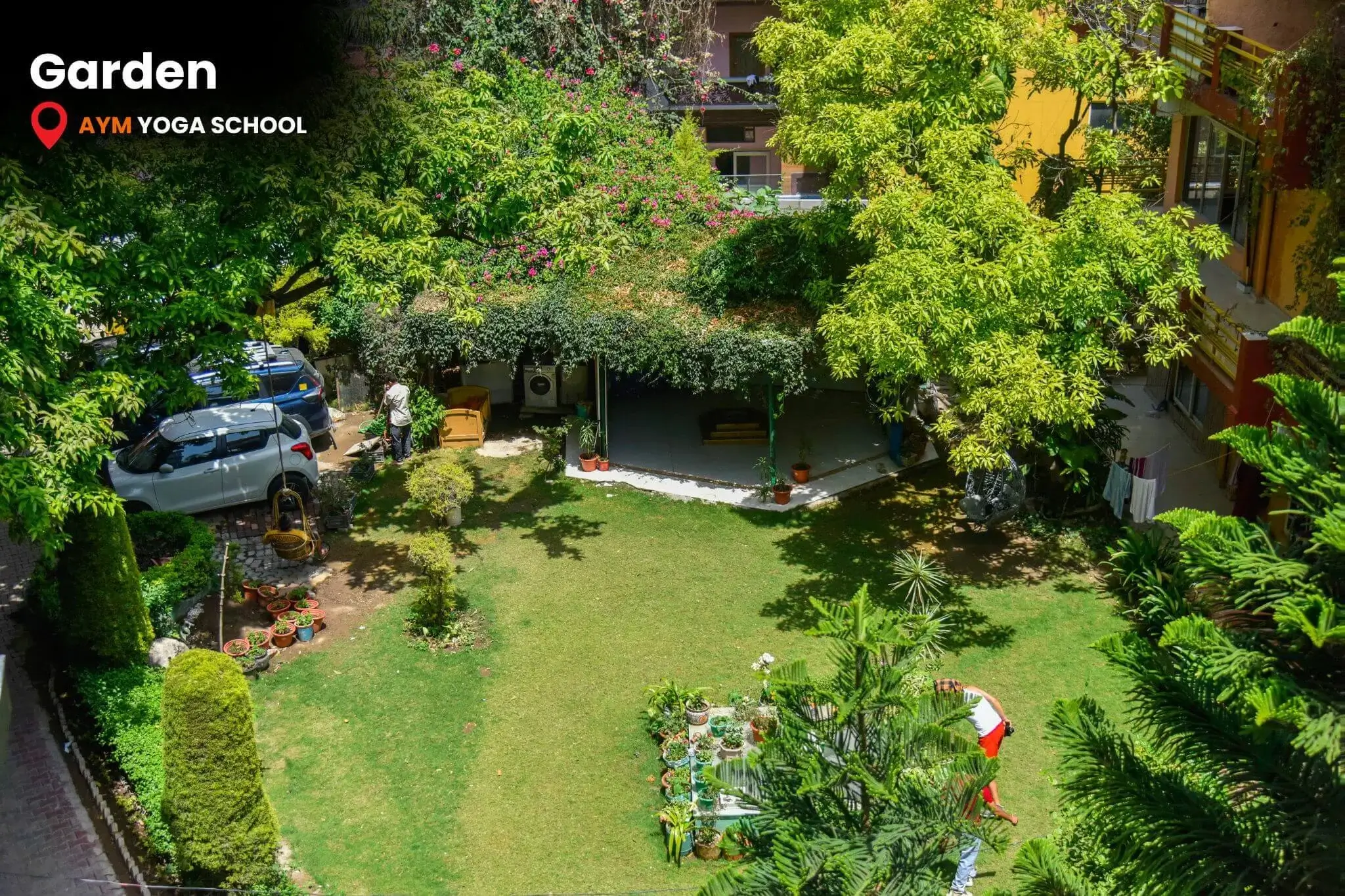 Peaceful garden area at AYM Yoga School in Rishikesh