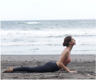 Cobra (Bhujangasana) or Upward Facing Dog (Urdhva Mukha Svanasana)